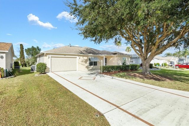 ranch-style home featuring a front yard and a garage