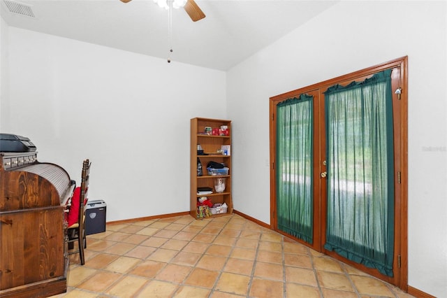 interior space featuring ceiling fan