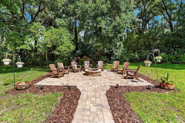 view of patio / terrace with an outdoor fire pit