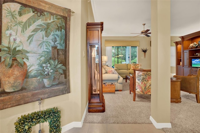 corridor with light colored carpet and ornamental molding