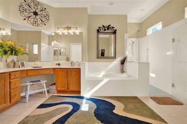 bathroom featuring plus walk in shower, vanity, tile patterned floors, and crown molding