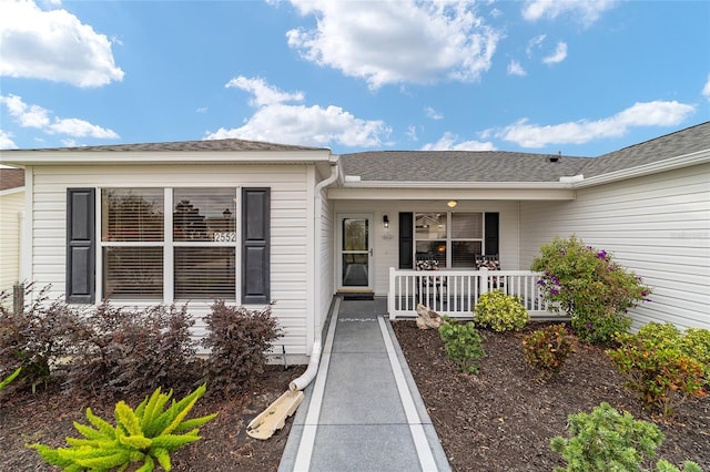 entrance to property with covered porch