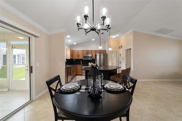 dining area featuring light tile patterned floors, a chandelier, baseboards, vaulted ceiling, and crown molding