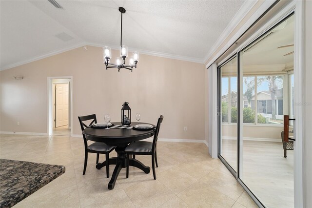 dining space featuring baseboards, ornamental molding, an inviting chandelier, vaulted ceiling, and light tile patterned flooring