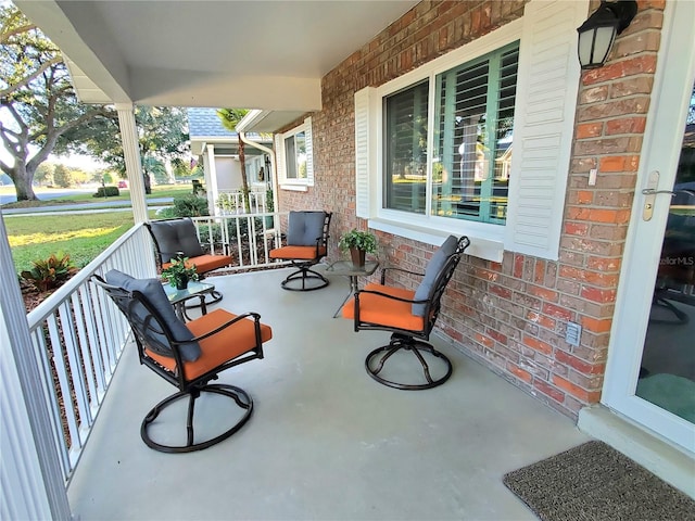 view of patio featuring a porch