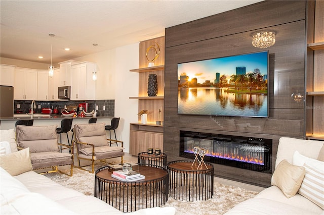 living room with a large fireplace