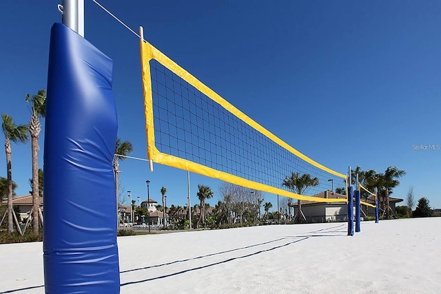 view of property's community featuring volleyball court