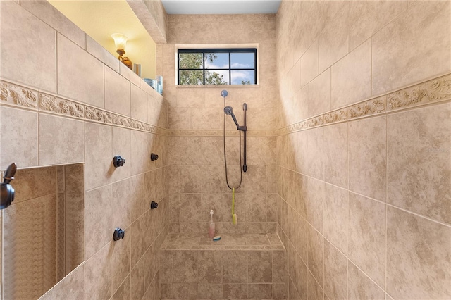 bathroom featuring tiled shower