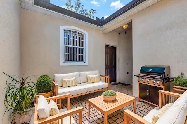 view of patio / terrace with an outdoor hangout area and area for grilling