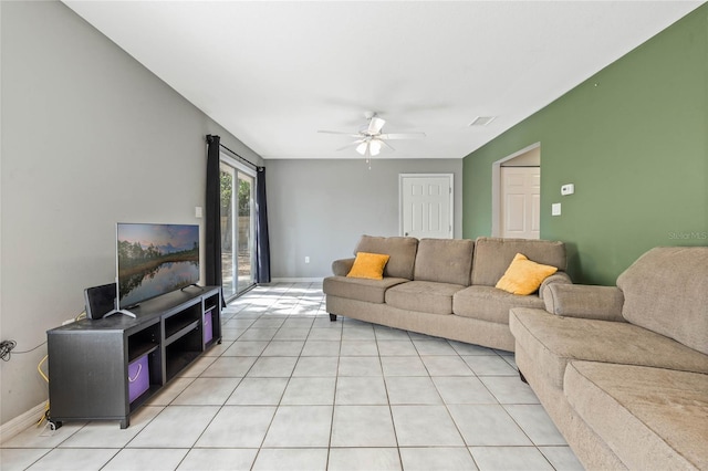 tiled living room featuring ceiling fan