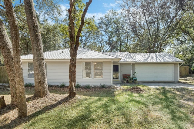 ranch-style house with a front yard and a garage