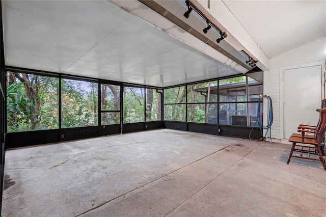 unfurnished sunroom with a healthy amount of sunlight