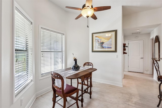 dining space featuring ceiling fan