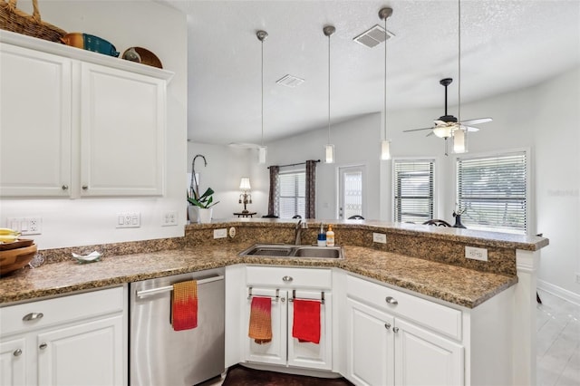 kitchen featuring kitchen peninsula, ceiling fan, sink, dishwasher, and white cabinetry