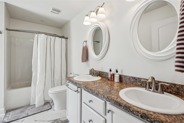 full bathroom featuring vanity, toilet, and shower / bath combo with shower curtain