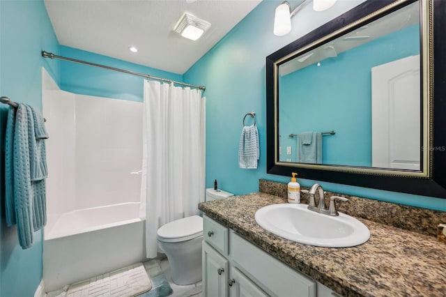 full bathroom featuring vanity, toilet, and shower / bath combo