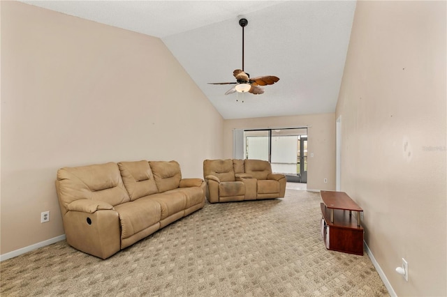 carpeted living room with ceiling fan and lofted ceiling