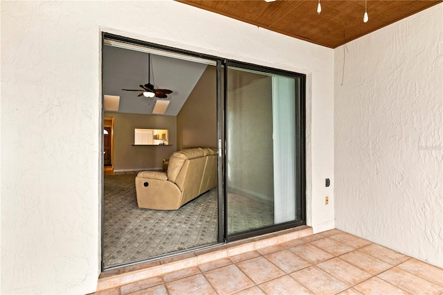 view of patio / terrace featuring ceiling fan