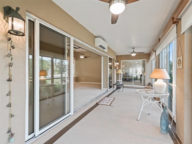 sunroom with plenty of natural light and a wall unit AC