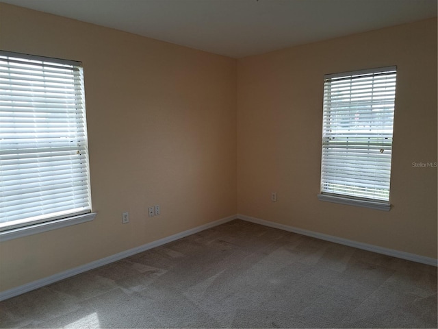 view of carpeted spare room