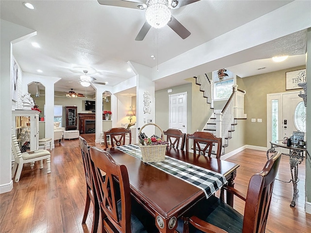 dining room featuring hardwood / wood-style flooring and ceiling fan