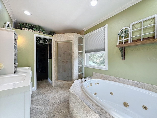 bathroom featuring crown molding, independent shower and bath, and vanity