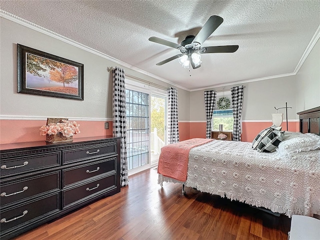 bedroom featuring a textured ceiling, ornamental molding, hardwood / wood-style flooring, and access to outside