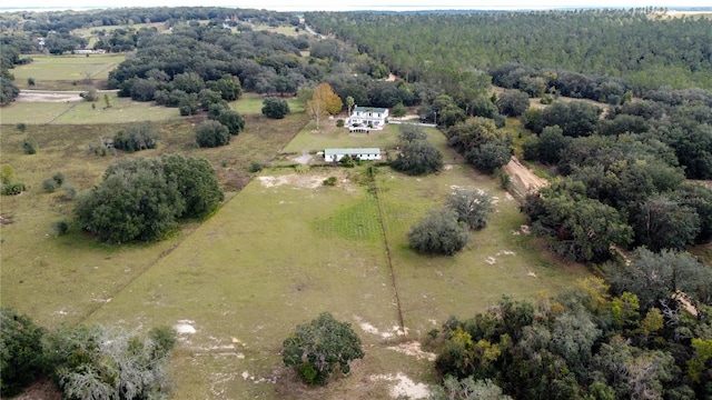 birds eye view of property featuring a rural view