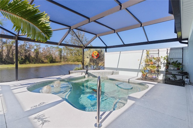 view of pool with glass enclosure, a water view, and a patio