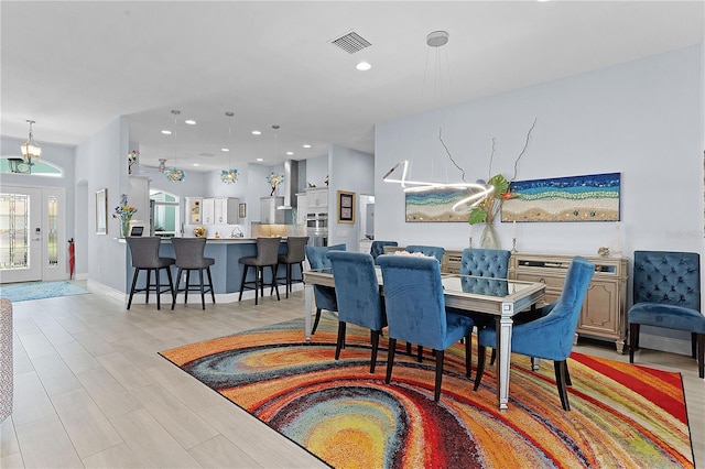 dining area featuring light hardwood / wood-style flooring