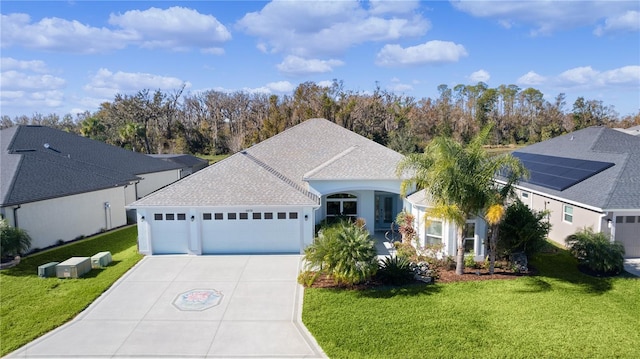 single story home featuring central AC, a garage, and a front lawn