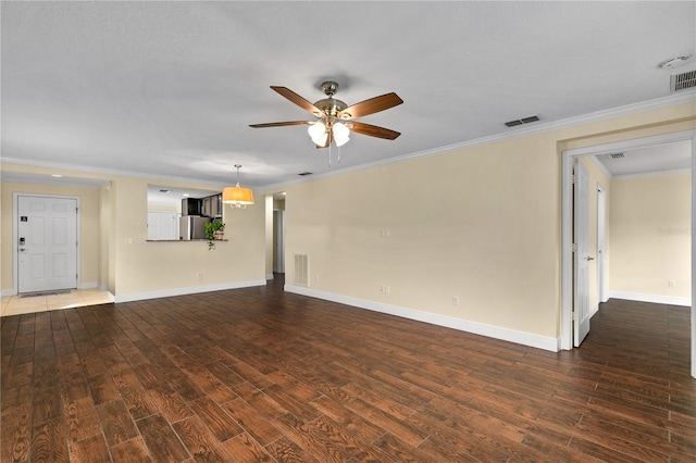 unfurnished living room with ceiling fan, hardwood / wood-style floors, and crown molding