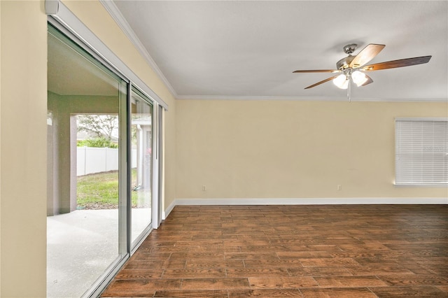 empty room featuring ceiling fan, dark hardwood / wood-style flooring, and crown molding