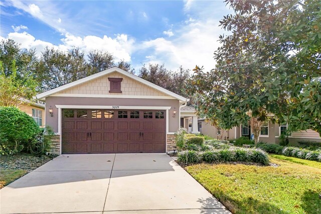 craftsman-style home featuring a garage