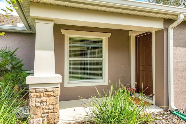 entrance to property with a porch