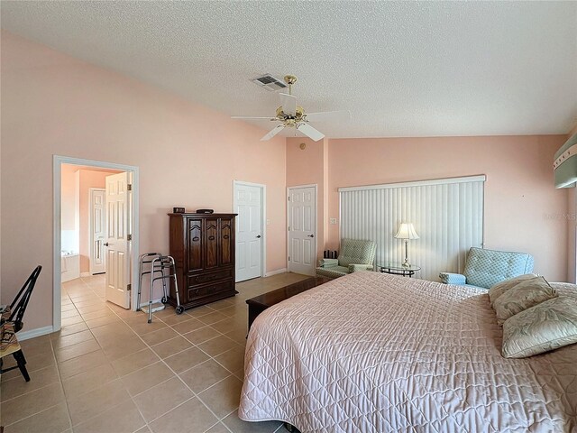4634 Summerbridge Cir, Leesburg, FL 34748 - bedroom featuring tile patterned flooring, a textured ceiling, baseboards, ceiling fan, and high vaulted ceiling