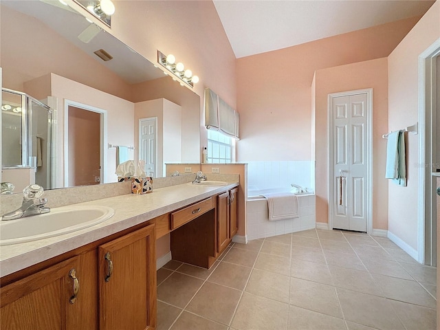 bathroom featuring tile patterned flooring, vanity, and independent shower and bath