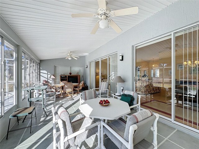 4634 Summerbridge Cir, Leesburg, FL 34748 - sunroom featuring ceiling fan, outdoor dining space, and vaulted ceiling
