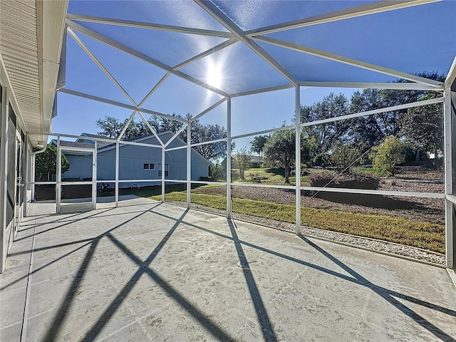 view of patio with a lanai