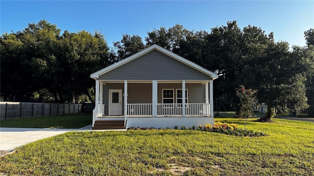 bungalow with a front yard