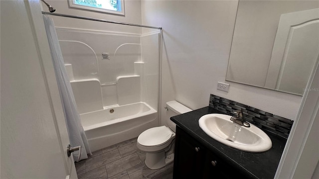 full bathroom featuring vanity, toilet, shower / bathtub combination with curtain, and backsplash