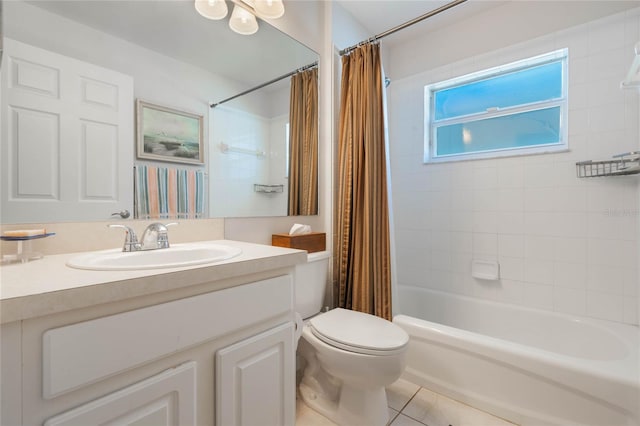 full bathroom with tile patterned flooring, shower / bath combination with curtain, vanity, and toilet