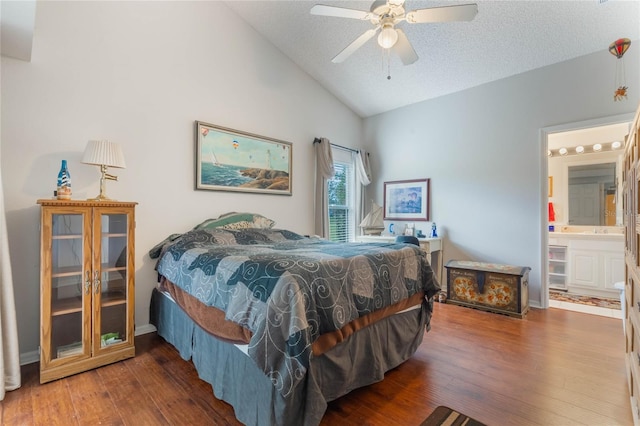 4130 Capland Ave, Clermont, FL 34711 - bedroom featuring vaulted ceiling, wood finished floors, ceiling fan, a textured ceiling, and ensuite bathroom