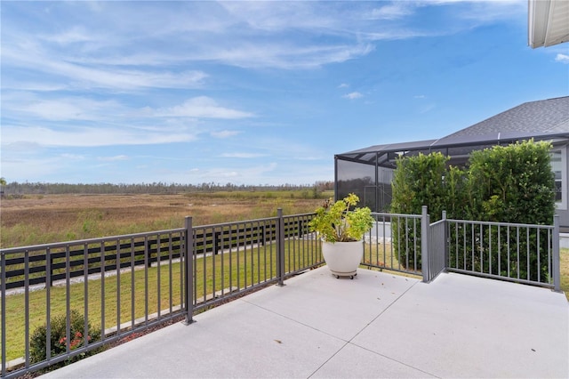 view of patio / terrace with glass enclosure