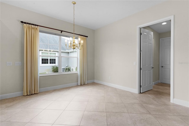 unfurnished dining area featuring light tile patterned flooring and a chandelier