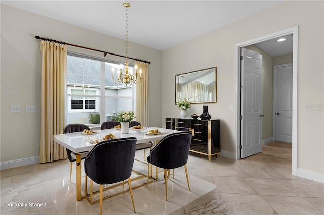 dining area with a notable chandelier