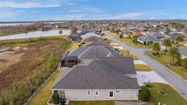 drone / aerial view featuring a water view