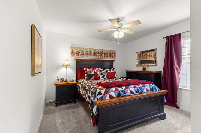 bedroom featuring ceiling fan and carpet floors