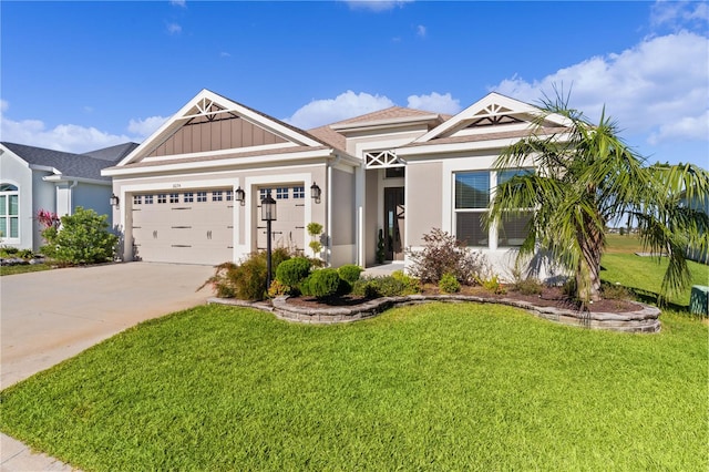 view of front facade featuring a garage and a front lawn