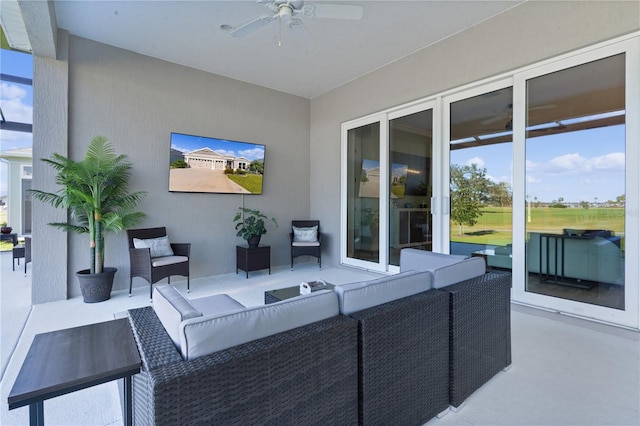 view of patio / terrace featuring ceiling fan and an outdoor hangout area